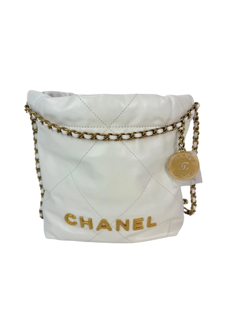Chanel 22 Mini Shiny Calfskin Quilted White Crossbody Hand Bag: Title: Chanel 22 Mini Shiny Calfskin Quilted White Crossbody Hand Bag Description: Pre-Owned 100% Authentic Spring Summer 2026 Pre-Collection Chanel 22 Mini Shiny Calfskin Quilted White Crossbody