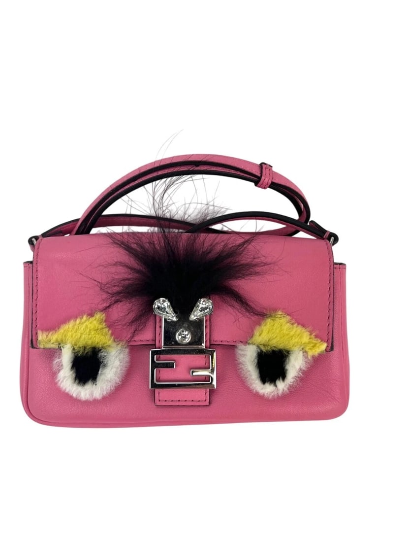 Fendi Monster Baguette Pink Leather Micro Crossbody Bag: Title: Fendi Monster Baguette Pink Leather Micro Crossbody Bag Description: Pre-Owned 100% Authentic Fendi Monster Baguette Pink Leather Micro Crossbody Bag RATING: B...Very Good, well maintained, sho