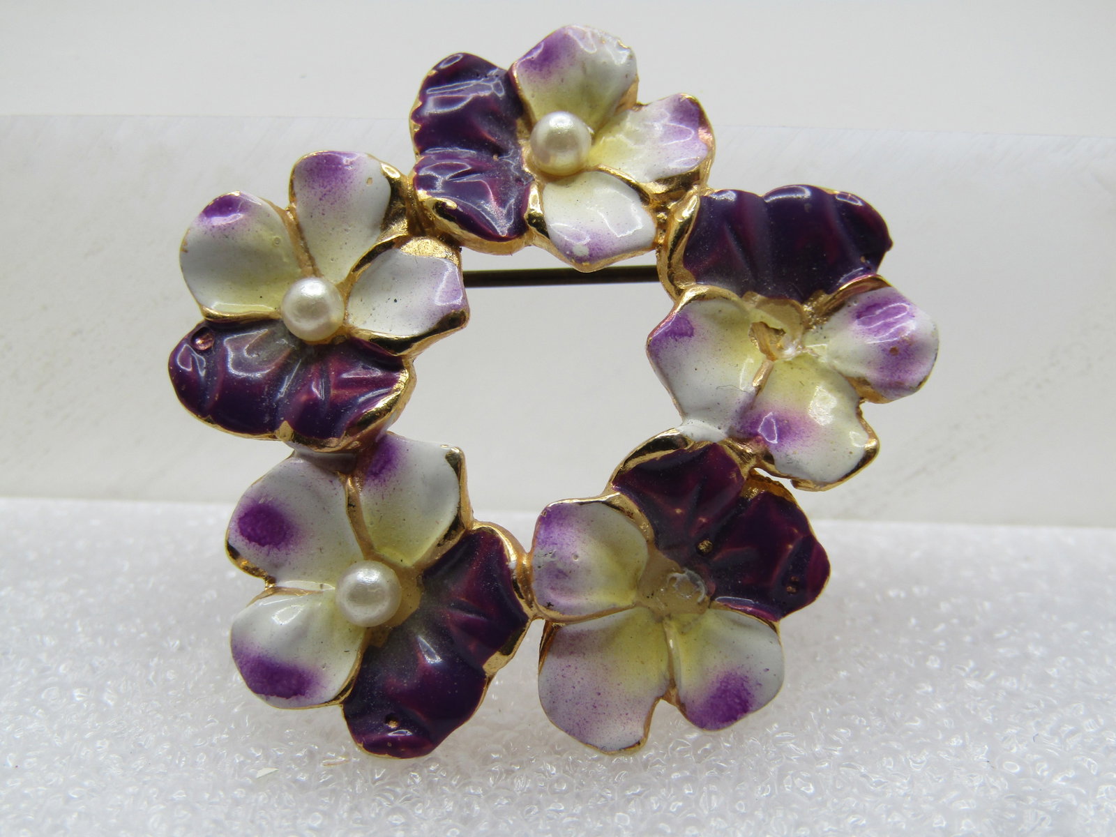 Vintage Enameled Violets Circle Brooch, Faux Pearl Centers, 1960's: Title: Vintage Enameled Violets Circle Brooch, Faux Pearl Centers, 1960's Description: Vintage Enameled Violets Circle Brooch, Faux Pearl Centers, 1960's. This is gold tone with enameling on the front