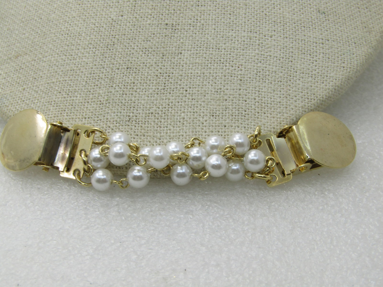 Vintage Triple Faux Pearl Strand Sweater Guard , 3.75", Gold Tone, 1970's-1980's: Title: Vintage Triple Faux Pearl Strand Sweater Guard , 3.75", Gold Tone, 1970's-1980's Description: Vintage Triple Faux Pearl Strand Sweater Guard , 3.75", Gold Tone, 1960's-1980's. Grat to hold swea