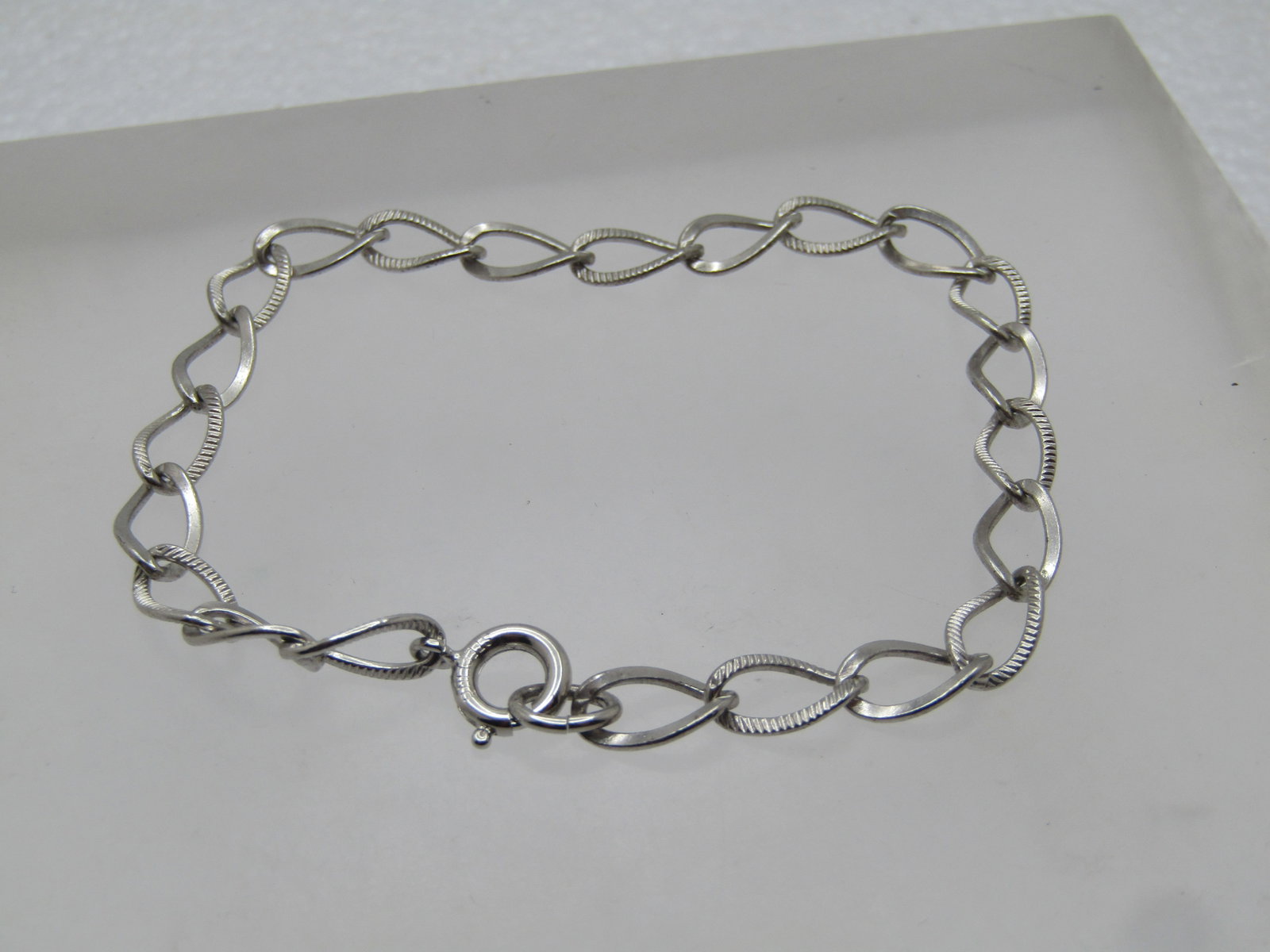 Vintage Sterling Charm Bracelet, 7", 17 Charms, 1960's-1970's: Title: Vintage Sterling Charm Bracelet, 7", 17 Charms, 1960's-1970's Description: Vintage Sterling Charm Bracelet, 7", 17 Charms, 1960's-1970's. It is appx. 5.5mm wide with a spring clasp. It is marke