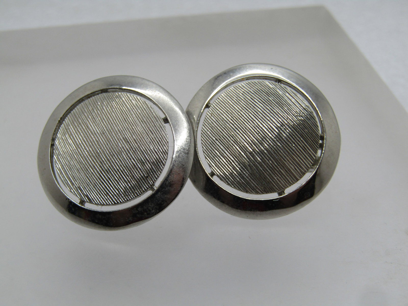 Vintage Brushed and Smooth Silver Clip Earrings, 1950's-1960's, 1": Title: Vintage Brushed and Smooth Silver Clip Earrings, 1950's-1960's, 1" Description: Vintage Brushed and Smooth Silver Clip Earrings, 1950's-1960's, 1". The center is a brushed, textured circle with