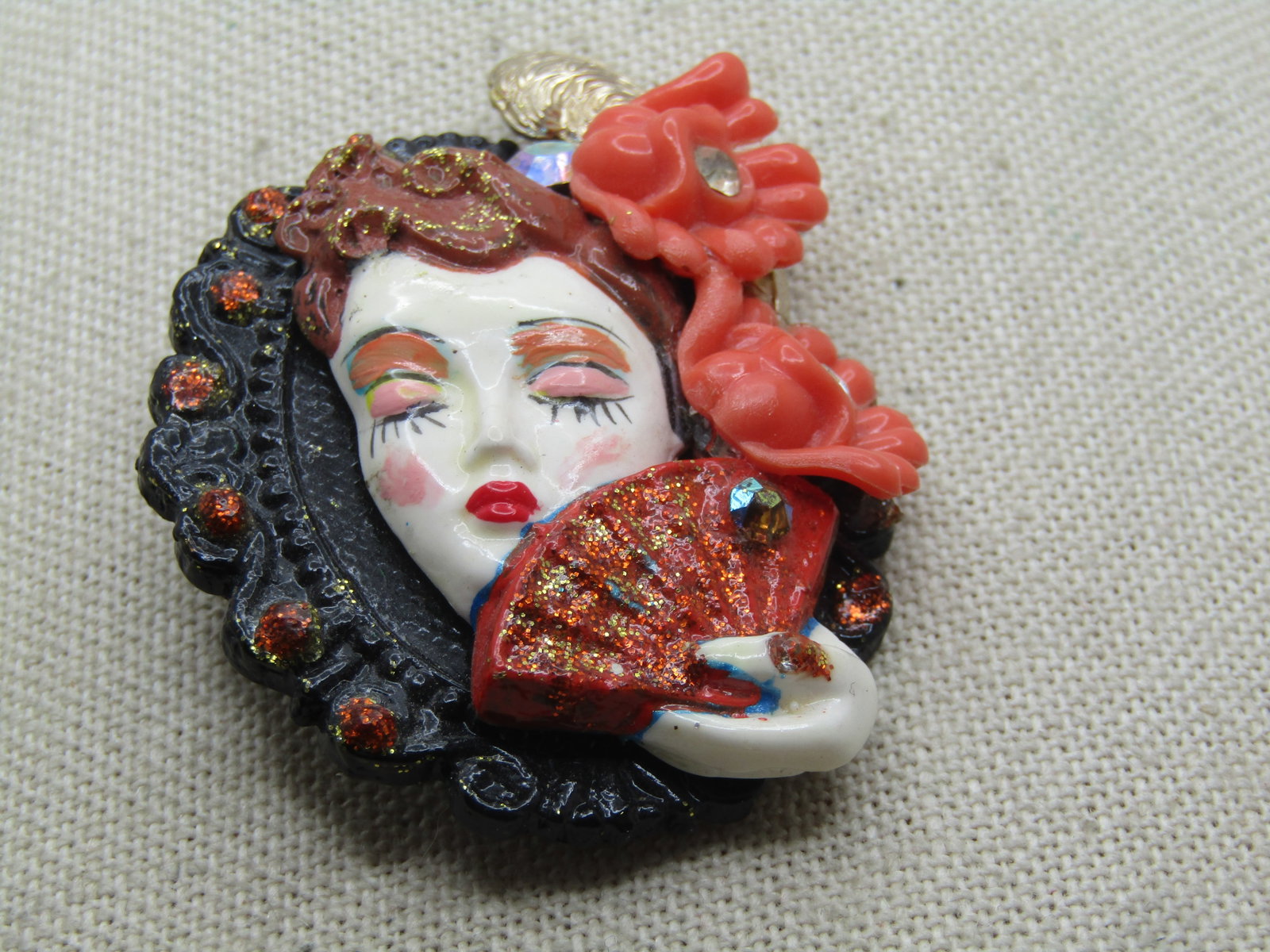 Vintage Woman With Fan & Flowers Brooch, Porcelain, 1960's-1970's: Title: Vintage Woman With Fan & Flowers Brooch, Porcelain, 1960's-1970's Description: Vintage Woman With Fan & Flowers Brooch, Porcelain, 1960's-1970's. This is a layered design with a black scalloped