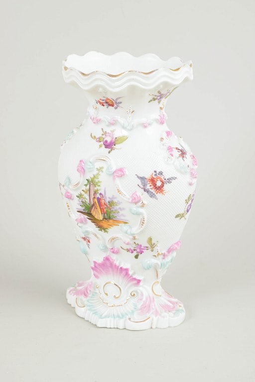 Meissen, Germany. Porcelain vase with floral and landscape decoration. Early 19th century.: Meissen vase, early 19th century. Rare porcelain vase with rich relief modelling and hand-painted polychrome floral and landscape decoration. Shaped foot and scalloped rim. A fine example of Meissen's