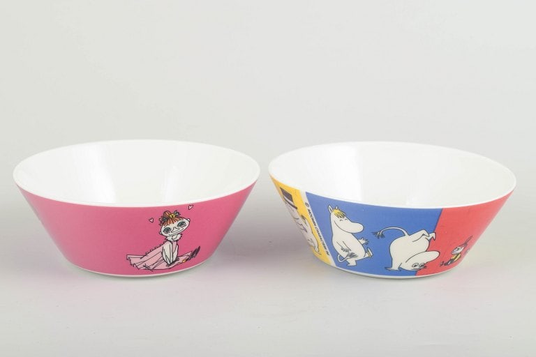 Arabia, Finland. Two colourful porcelain Moomin bowls. 21st century.: Arabia Finland Moomin bowls, 21st century. Two colourful decorative porcelain bowls by Arabia Finland, each featuring classic character motifs from Tove Jansson's Moomin universe. One bowl shows Mymbl