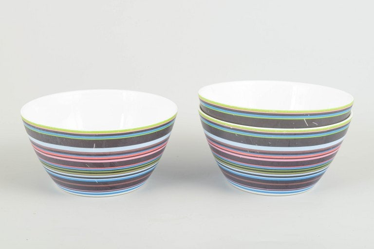 Alfredo Häberli for Iittala, Finland. Three colourful porcelain bowls with multicoloured horizontal: Alfredo Häberli for Iittala Bowls “Origo”, 2000s. Three colourful porcelain bowls from the iconic Origo series, decorated with the characteristic multicoloured horizontal stripes. Origin: Fin