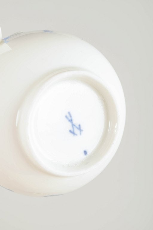 Meissen, Germany. Two porcelain creamers decorated with cobalt blue glaze, “Blue Onion??. Circa - 4