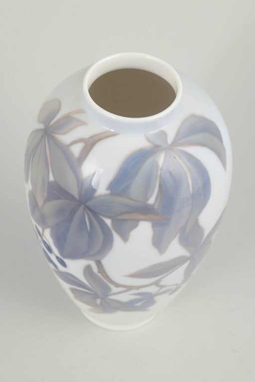 Royal Copenhagen, Denmark. Slender baluster-shaped porcelain vase decorated with leaves and berries - 2