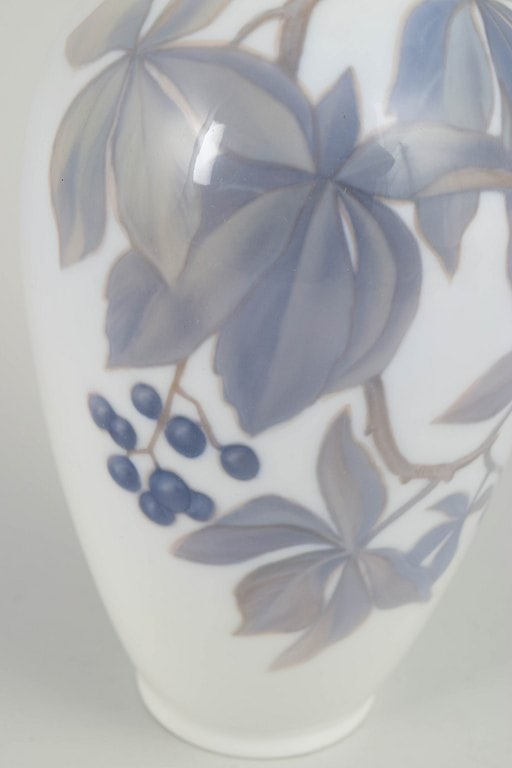 Royal Copenhagen, Denmark. Slender baluster-shaped porcelain vase decorated with leaves and berries - 3