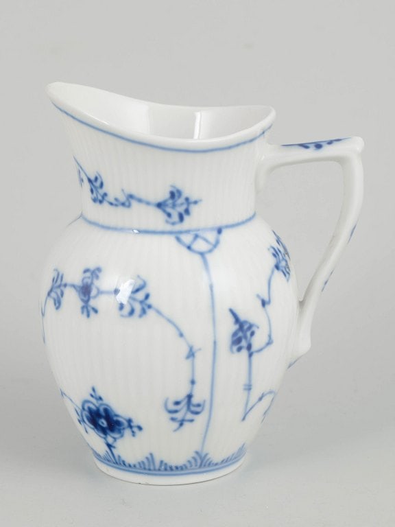 Royal Copenhagen, Denmark. Porcelain creamer decorated with cobalt-blue underglaze, Blue Fluted (1 of 4)