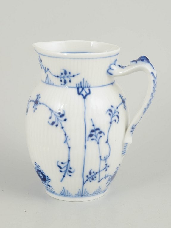 Royal Copenhagen, Denmark. Porcelain creamer decorated with cobalt-blue underglaze, Blue Fluted (1 of 4)