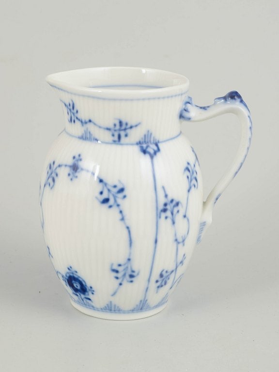 Royal Copenhagen, Denmark. Porcelain creamer decorated with cobalt-blue underglaze, Blue Fluted (1 of 4)