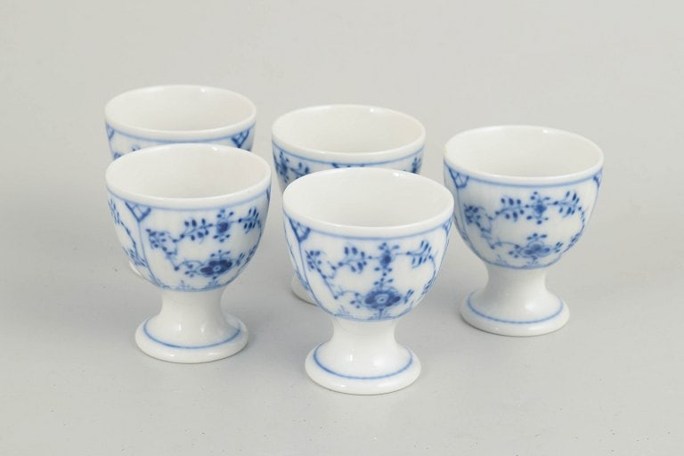 Royal Copenhagen, Denmark. Set of five porcelain egg cups decorated with cobalt-blue underglaze, (1 of 4)