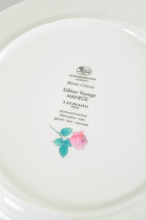 Hutschenreuther, Germany. Set of four porcelain dinner plates with a colourful pattern. Late 20th - 4
