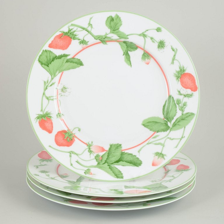 Bill Goldsmith for Limoges, France. Fraise, set of four porcelain charger plates. Approx. 1980s. (1 of 4)