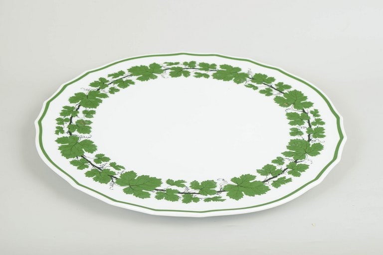 Meissen, Germany. Large round porcelain cake dish from the green vine leaf series. Early 20th - 2