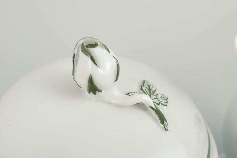 Meissen, Germany. Porcelain sugar bowl and creamer from the green vine leaf series. Early 20th - 2