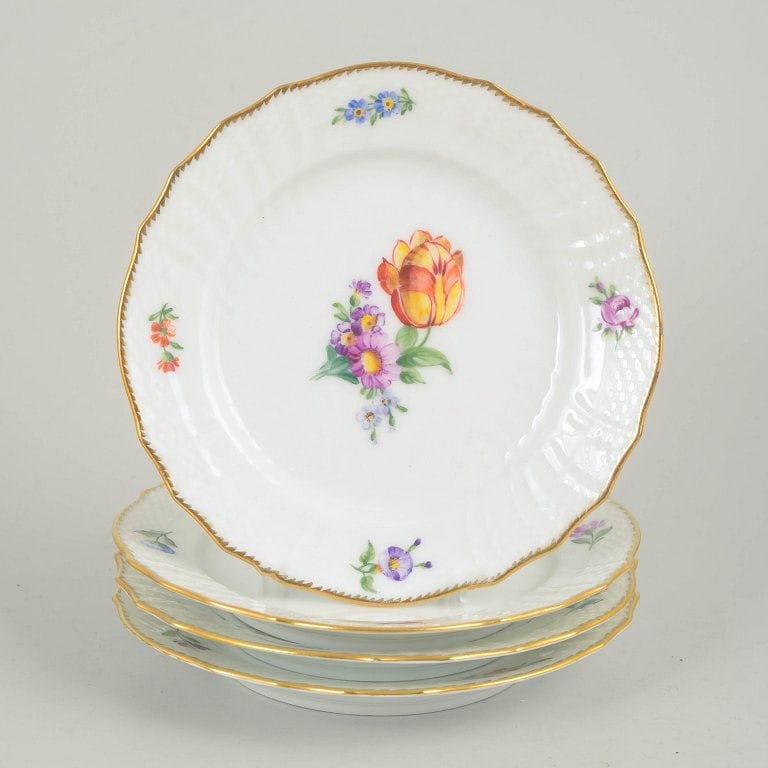 Royal Copenhagen, Denmark. Saxon Flower, set of four porcelain cake plates with floral decoration. (1 of 4)