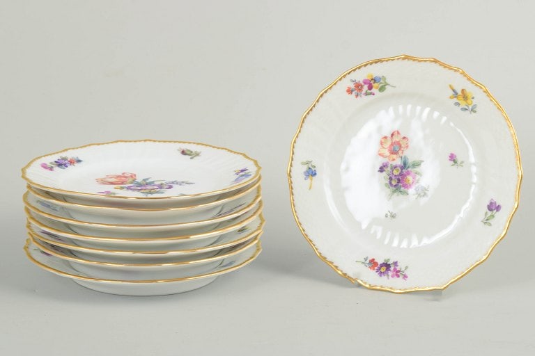 Royal Copenhagen, Denmark. Saxon Flower, set of eight porcelain cake plates with floral decoration. (1 of 4)