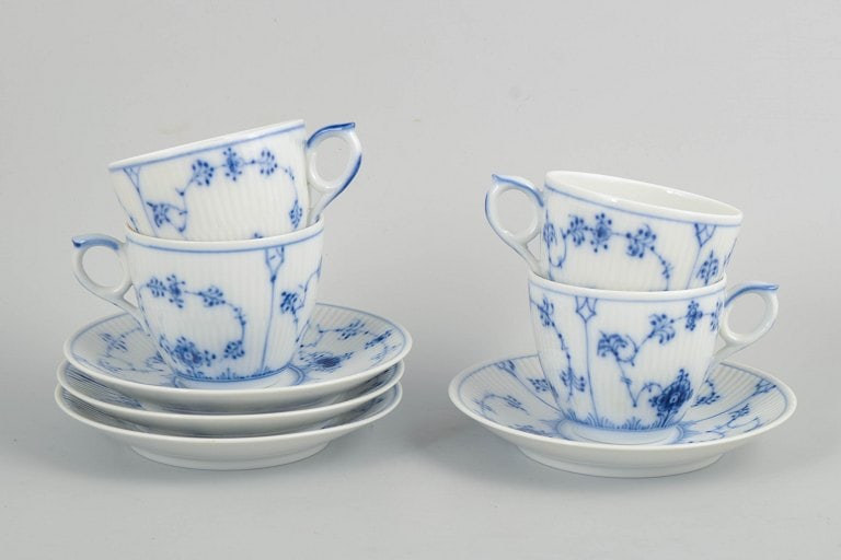 Royal Copenhagen, Denmark. Blue Fluted Plain, set of four porcelain coffee cups with saucers.: Royal Copenhagen, Blue Fluted Plain, coffee set for 4 persons. Porcelain coffee set from the Blue Fluted Plain series, consisting of cups and saucers for four persons, model 1/2162. Classic fluted for