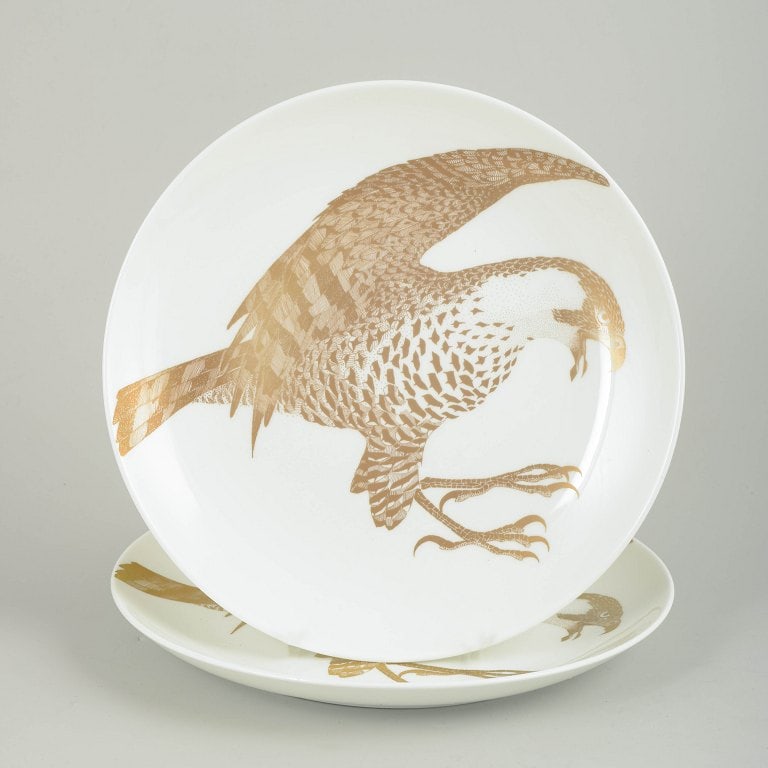 Paul Hoff for Gustavsberg, Sweden. Set of two porcelain plates decorated with bird motifs in gold. (1 of 4)