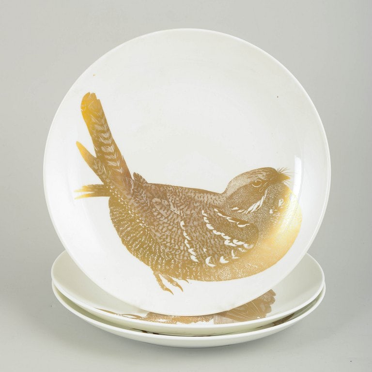 Paul Hoff for Gustavsberg, Sweden. Set of three porcelain plates decorated with bird motifs in gold. (1 of 4)