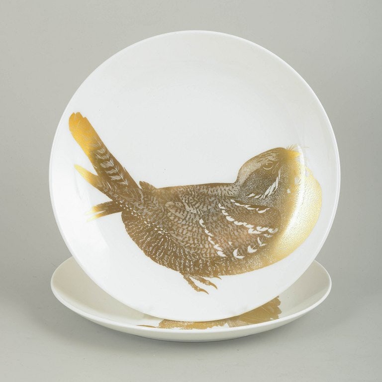 Paul Hoff for Gustavsberg, Sweden. Set of two porcelain plates decorated with bird motifs in gold. (1 of 4)