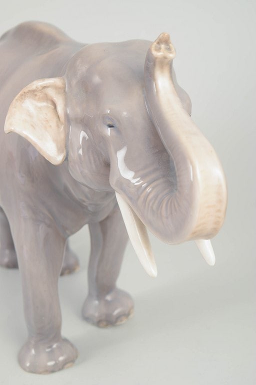 Royal Copenhagen, Denmark. Large porcelain African elephant figure with raised trunk. Approx. 1920s. - 3
