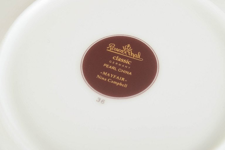 Nina Campbell for Rosenthal, Germany. Set of ten small round porcelain plates decorated with a dark - 4