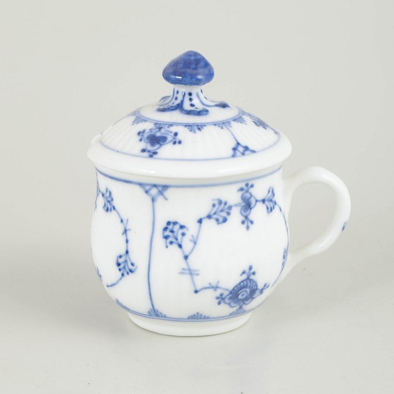Royal Copenhagen, Denmark. Blue Fluted Plain porcelain cream cup with lid decorated with blue: Royal Copenhagen, Blue Fluted Plain cream cup with lid. Cream cup, in hand-painted underglaze cobalt blue decoration in the classic Blue Fluted Plain pattern. Model 1/64, first quality. Origin: Denmar