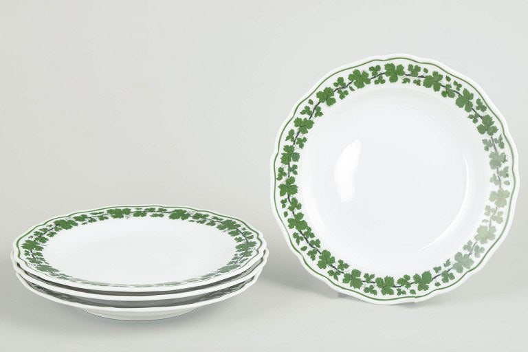 Meissen, Germany. Set of four porcelain salad plates with a green vine leaf border. Approx. 1930s. (1 of 4)