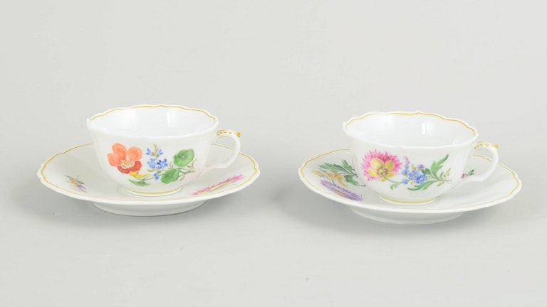 Meissen, Germany. Pair of porcelain coffee cups with saucers with polychrome flowers. Early 20th (1 of 4)