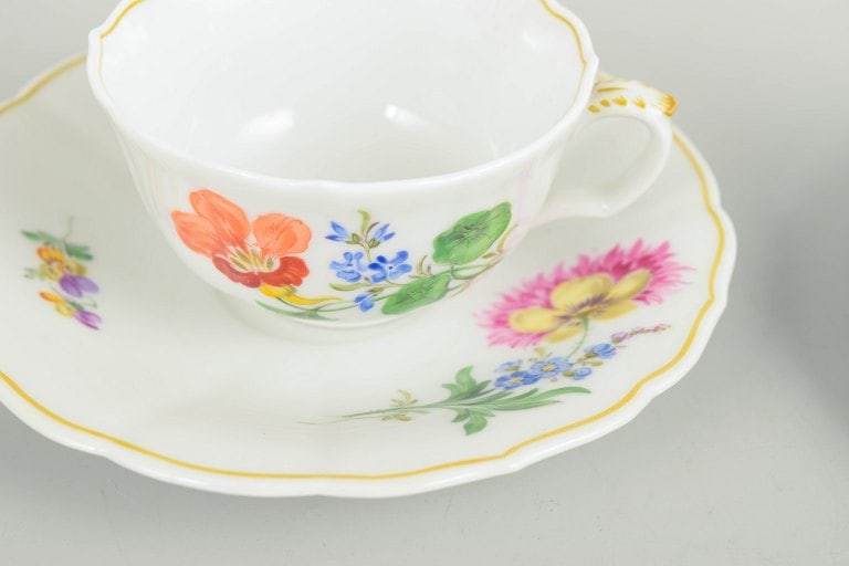 Meissen, Germany. Pair of porcelain coffee cups with saucers with polychrome flowers. Early 20th - 3