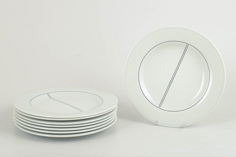 Stig Lindberg for Gustavsberg, Sweden. Set of eight faience plates with white glaze. Approx. 1960s. (1 of 4)