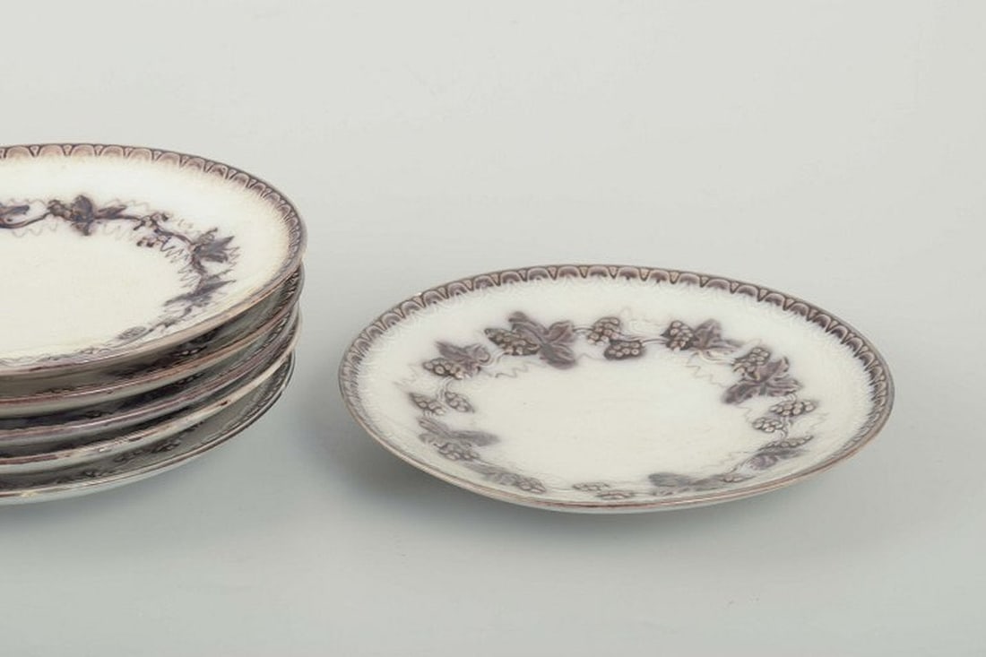 Gefle, Sweden. Set of twelve round 'Mullbär' faience plates with relief decoration. 1930s. - 3