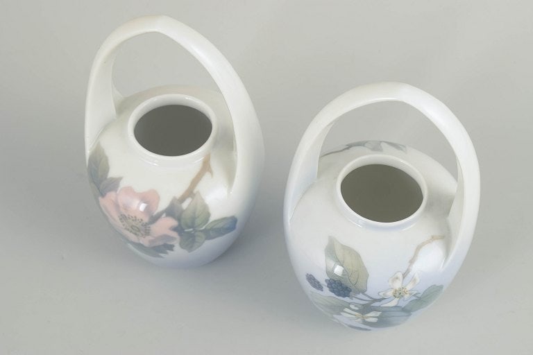 Royal Copenhagen, Denmark. Art Nouveau, set of two porcelain vases with handles. Circa 1910s. - 2