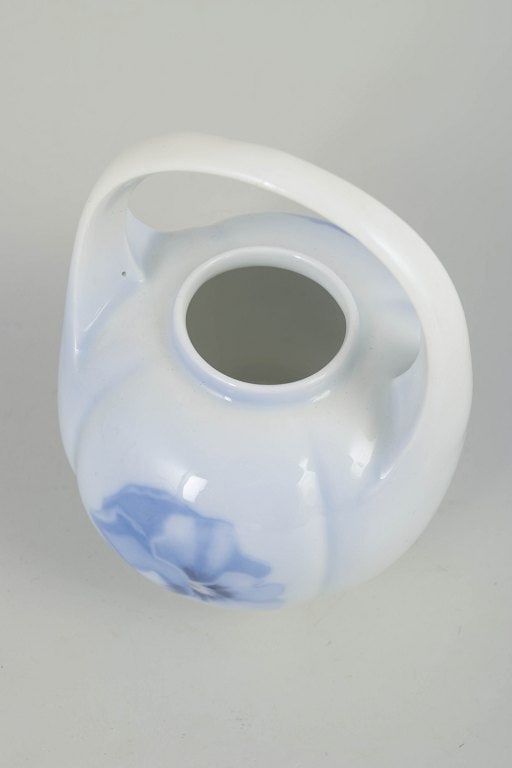 Royal Copenhagen, Denmark. Art Nouveau porcelain vase with handle with floral motif. Approx. 1900s. - 2