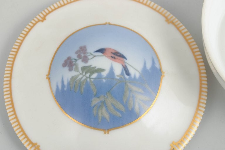 Royal Copenhagen, Denmark. Art Deco porcelain lidded dish with gilt rim and bird motif. Approx. - 3