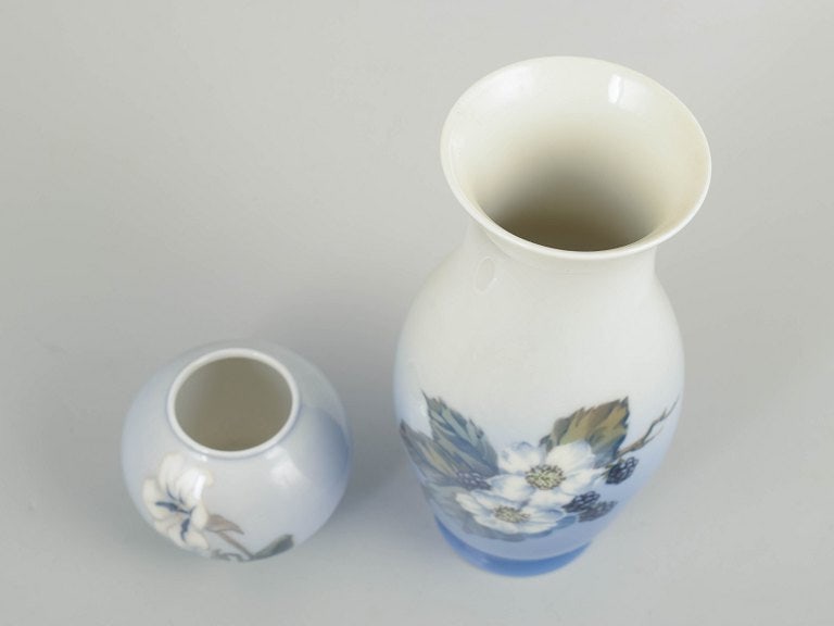Royal Copenhagen, Denmark. Set of two porcelain vases with floral decoration in blue tone. 20th - 2