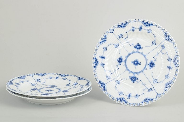Royal Copenhagen, Denmark. Blue Flower Full Lace set of three porcelain dinner plates with: Royal Copenhagen, Blue Fluted Full Lace dinner plates, set of 3. Model 1/1084. Set of three plates in glazed porcelain with hand-painted underglaze decoration in the classic Blue Fluted Full Lace