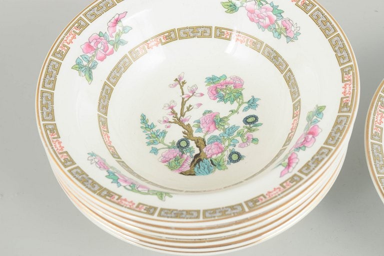 Wedgwood & Co Ltd, England. Set of seven porcelain bowls with floral motifs and gilt border. Approx. - 3