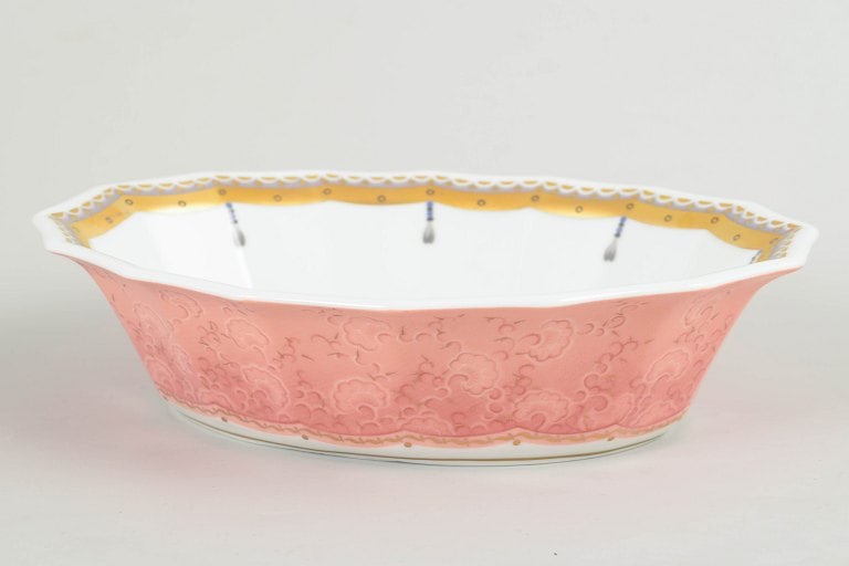 Royal Copenhagen, Denmark. Low bowl in white porcelain with decoration in pink tones. Approx.: Royal Copenhagen, Fairytale bowl. Low bowl in white porcelain decorated with the Fairytale pattern in soft pink tones with delicate ornamental detailing. Produced between 1992 and 1999 in first factor