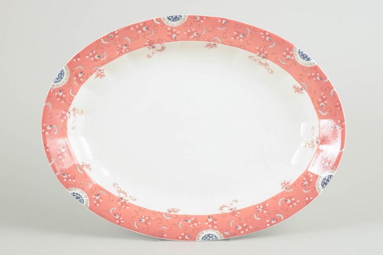 Royal Copenhagen, Denmark. Fairytale large oval dish in white porcelain with decoration in pink: Royal Copenhagen, Fairytale large dish. Large oval dish in white porcelain decorated with the Fairytale pattern along the rim in soft pink tones with delicate ornamental detailing. The dish was produc
