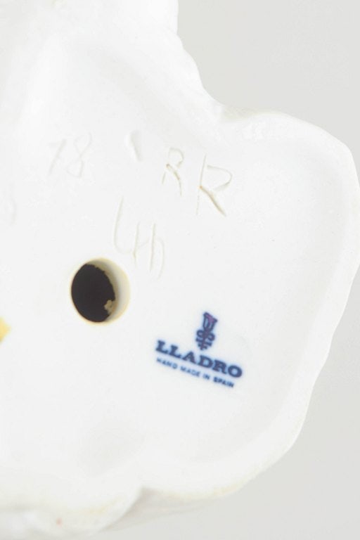 Lladró, Spain. Porcelain dog figurine in white glaze with grey and pale blue details. Approx. - 5