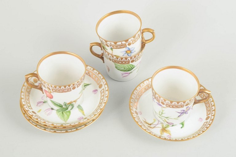 Royal Copenhagen, Denmark. Flora Danica set of four porcelain cups with matching saucers. Dated - 2