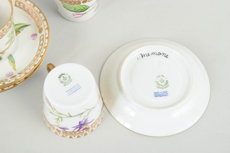 Royal Copenhagen, Denmark. Flora Danica set of four porcelain cups with matching saucers. Dated - 5