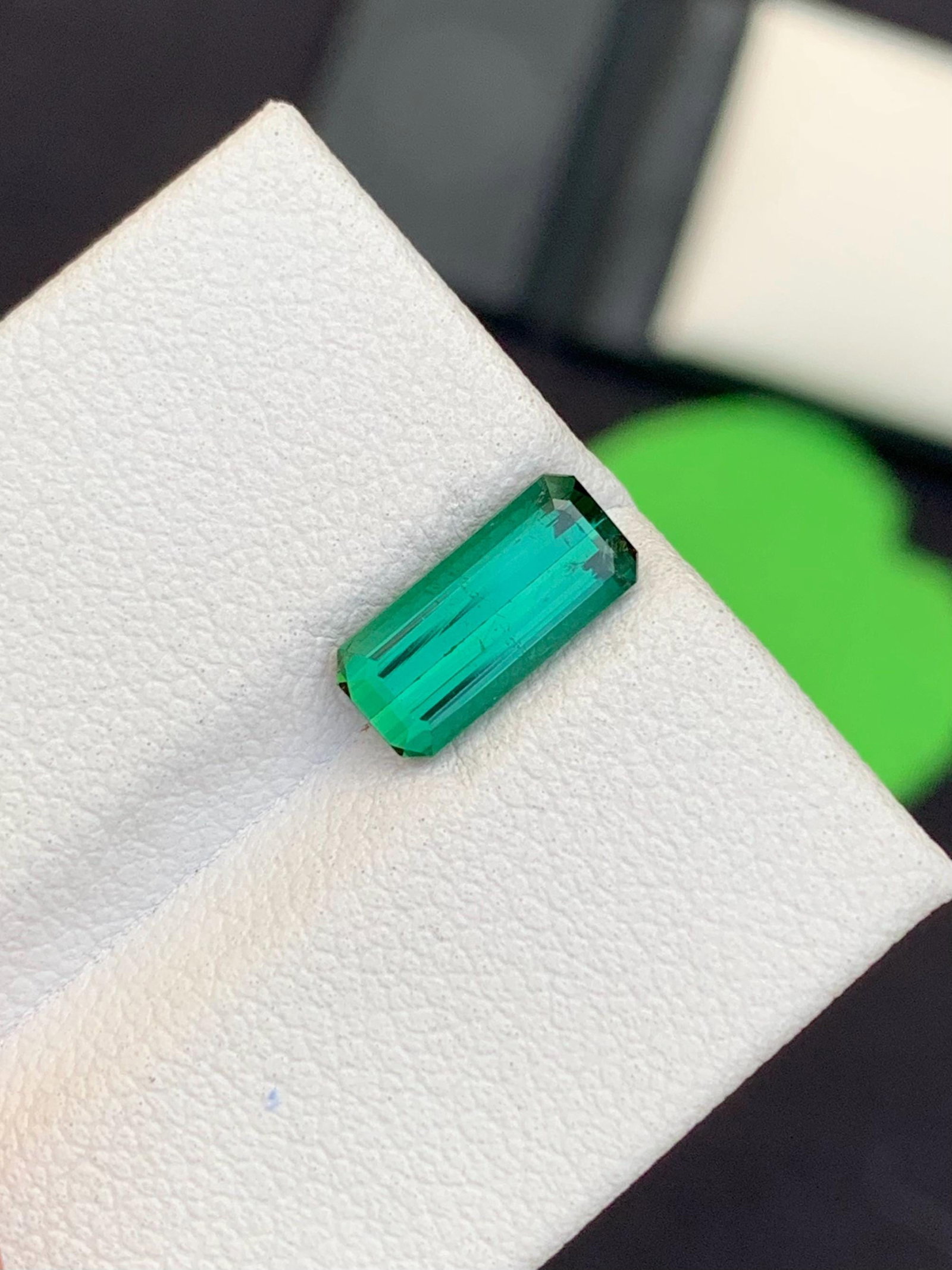 Natural Bright Cerulean Color Tourmaline Gemstone For Ring Making: Highlights Supplies for making crafts Materials: Gemstone: Tourmaline Natural Bright Cerulean Color Tourmaline Gemstone For Ring Making Weight : 1.40 Carat Dimensions : 9.500 x 4.000 x 3.000 mm Shape 