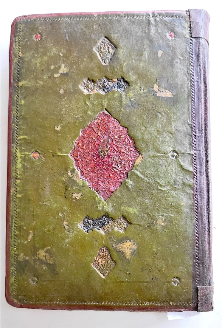 18th century ARABIC MANUSCRIPT antique POETRY & PROSE COLLECTION: Not dated (c. late 18th century) Purchased in Uzbekistan Original leather binding with embossed design Size 6 1/2 by 9 3/4" Nice calligraphy about 150 lvs (300 pp) Some wear, stains, a couple of damag