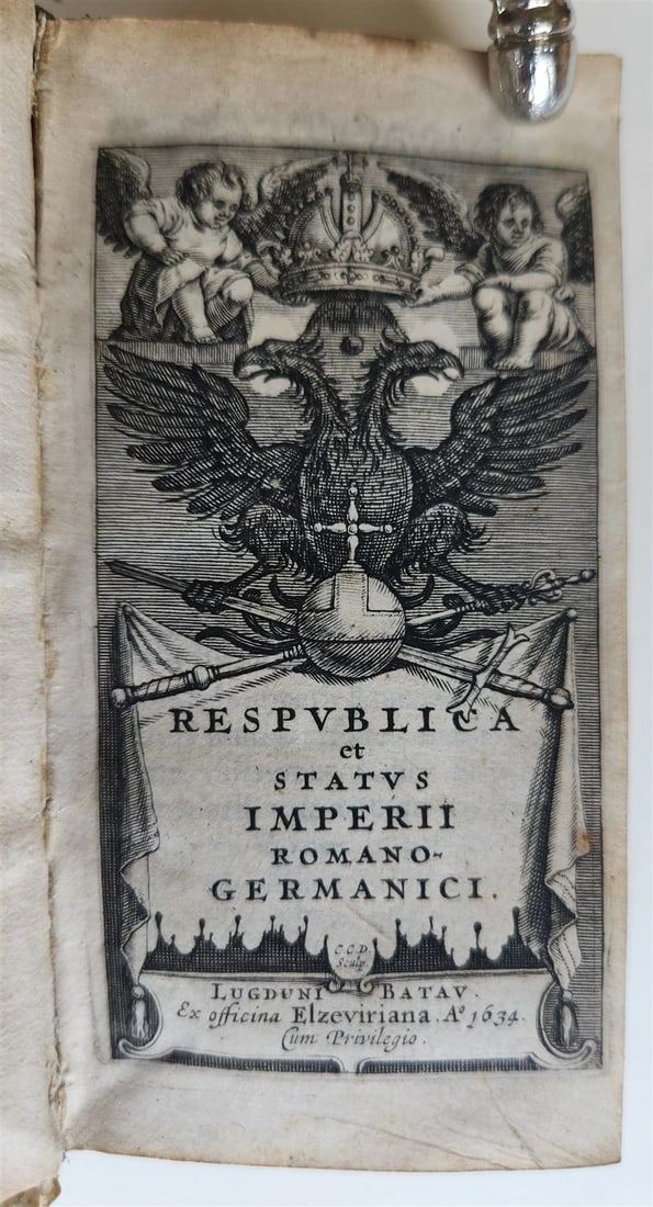 1634 RESPUBLICA ET STATUS IMPERII ROMANO GERMANICI antique ELZEVIER VELLUM BOUND: REPUBLICA ET STATUS IMPERII ROMANO GERMANICI. Lugduni Batavorum (Leiden): Ex officina Elzeviriana; 1634 8 lvs, 414, 382, 1 pp. Original overlapping vellum with manuscript title to the spine Size 2 1/2