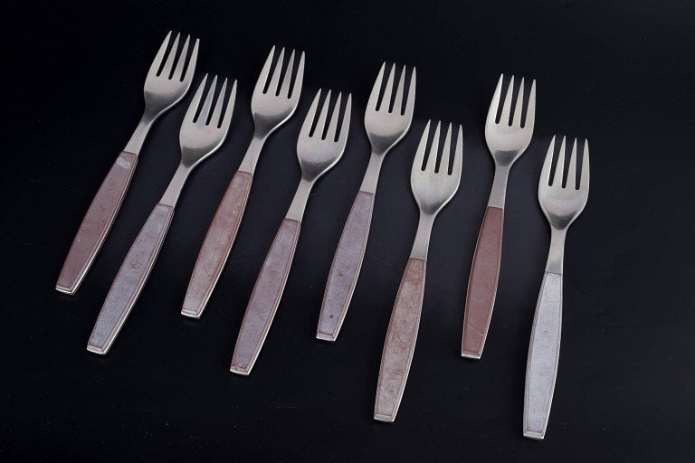 Henning Koppel for Georg Jensen, Denmark. Set of eight dinner forks in stainless steel with brown (1 of 4)